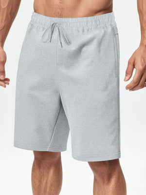 Light gray chino shorts with drawstring waist and pockets.