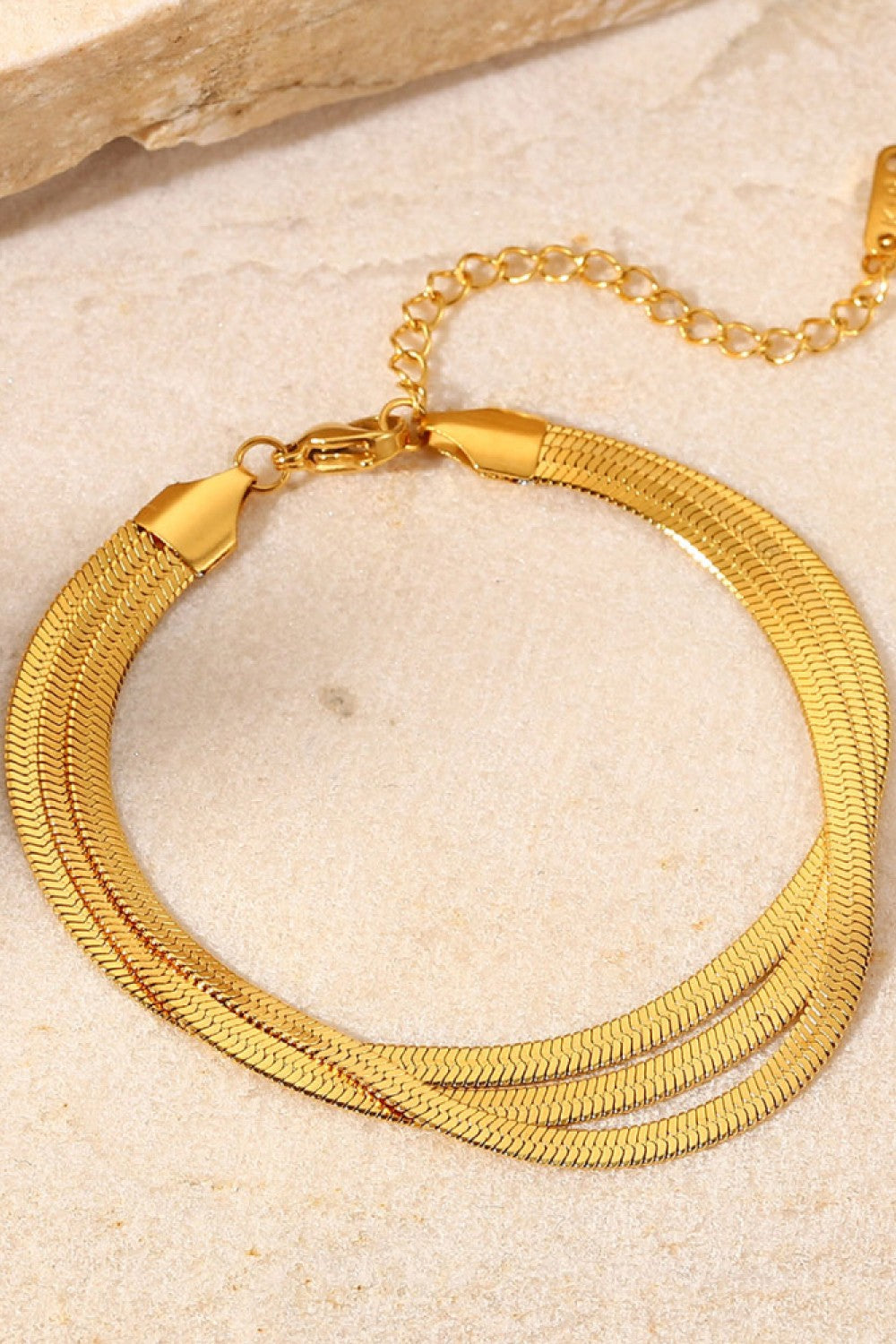 Gold triple herringbone chain bracelet with adjustable clasp