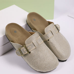 Khaki rhinestone buckle slip-on mules with cork sole and adjustable strap.