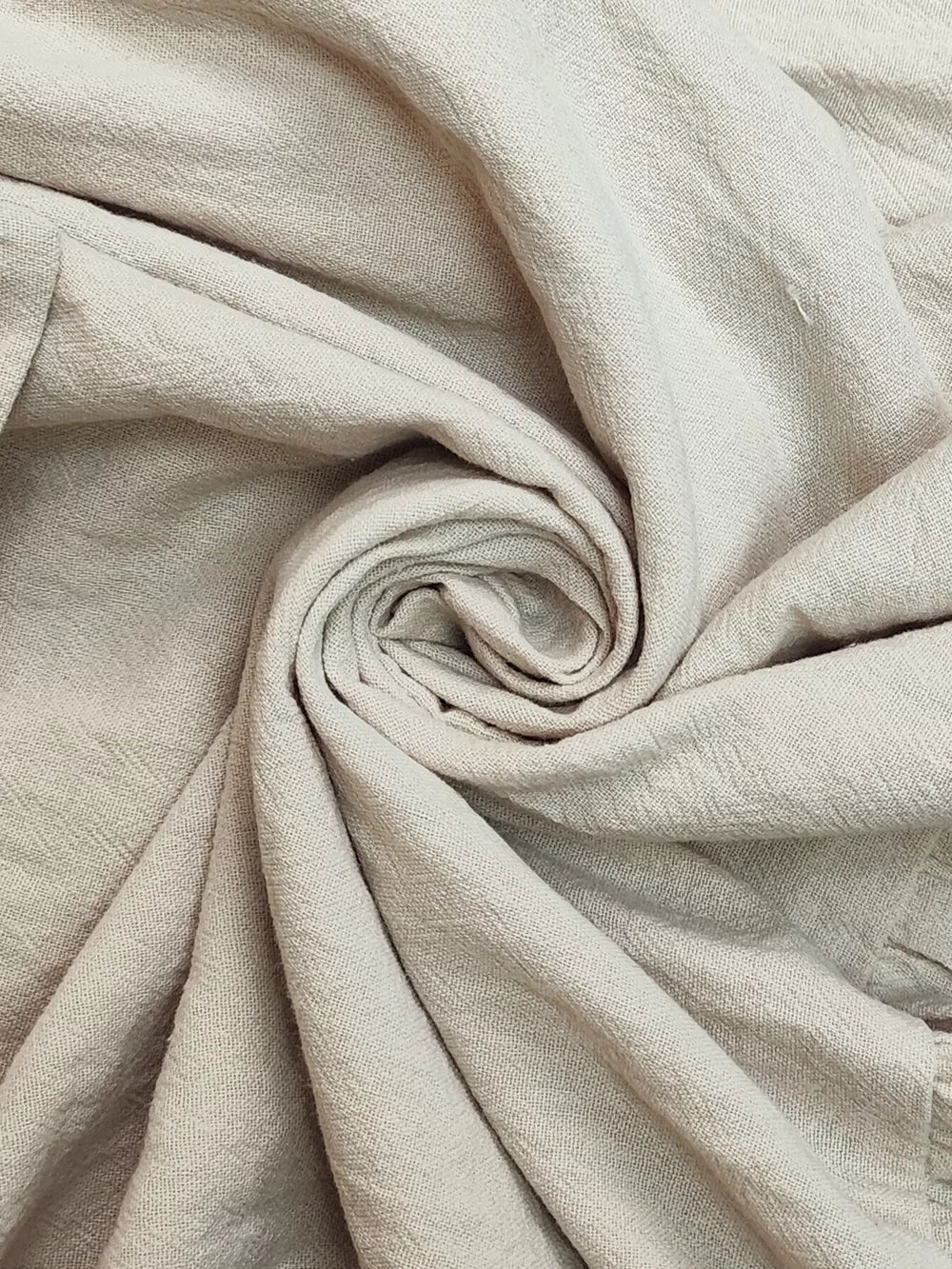 Belted ruffled hem maxi dress in khaki, showing textured fabric detail.