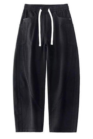 Black relaxed fit cotton jeans with drawstring waist and pocket details.