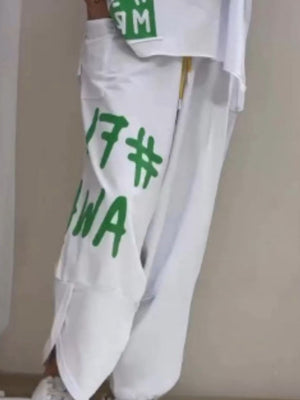 White graphic tee and drawstring pants set with green lettering