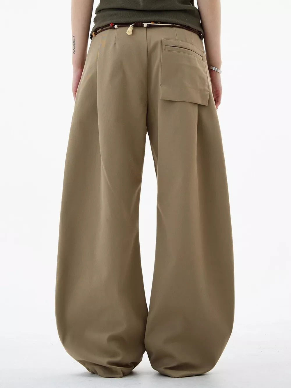 Men's relaxed fit wide-leg sweatpants in tan with a drawstring waist and back pocket detail.
