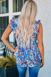 Painterly ruffle sleeve blouse in multi-color abstract print with cinched waist