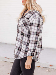Relaxed fit plaid button-down shirt in white with black and pink plaid.