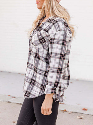 Relaxed fit plaid button-down shirt in white with black and pink plaid.