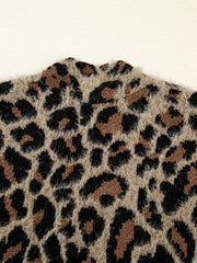 Leopard print fuzzy knit cardigan with a mock neck detail.