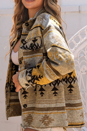 GeoChic collar jacket in camel with geometric pattern and chest pockets.
