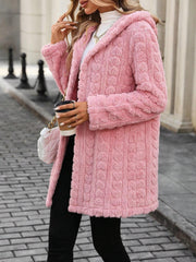 Blush pink textured hooded wrap coat with cable knit pattern.