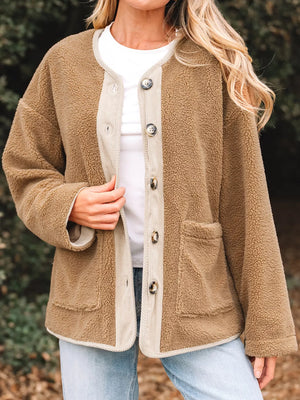 Plush corduroy patchwork jacket in camel with button front and patch pockets.