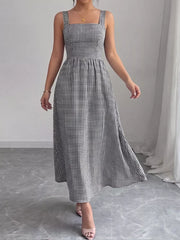 Black and white gingham midi dress with square neckline and a-line skirt.