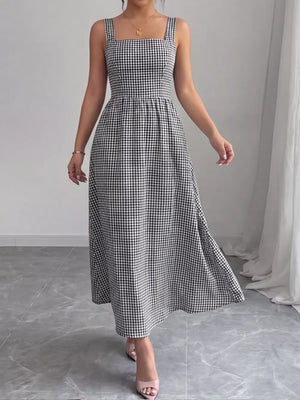 Black and white gingham midi dress with square neckline and a-line skirt.