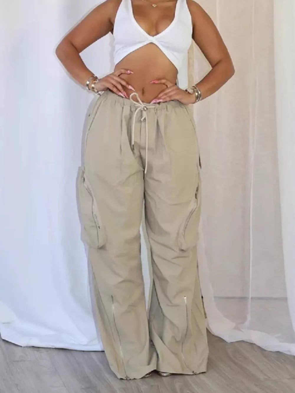 Drawstring Cargo Pants With Zipper Accents in Black, front view