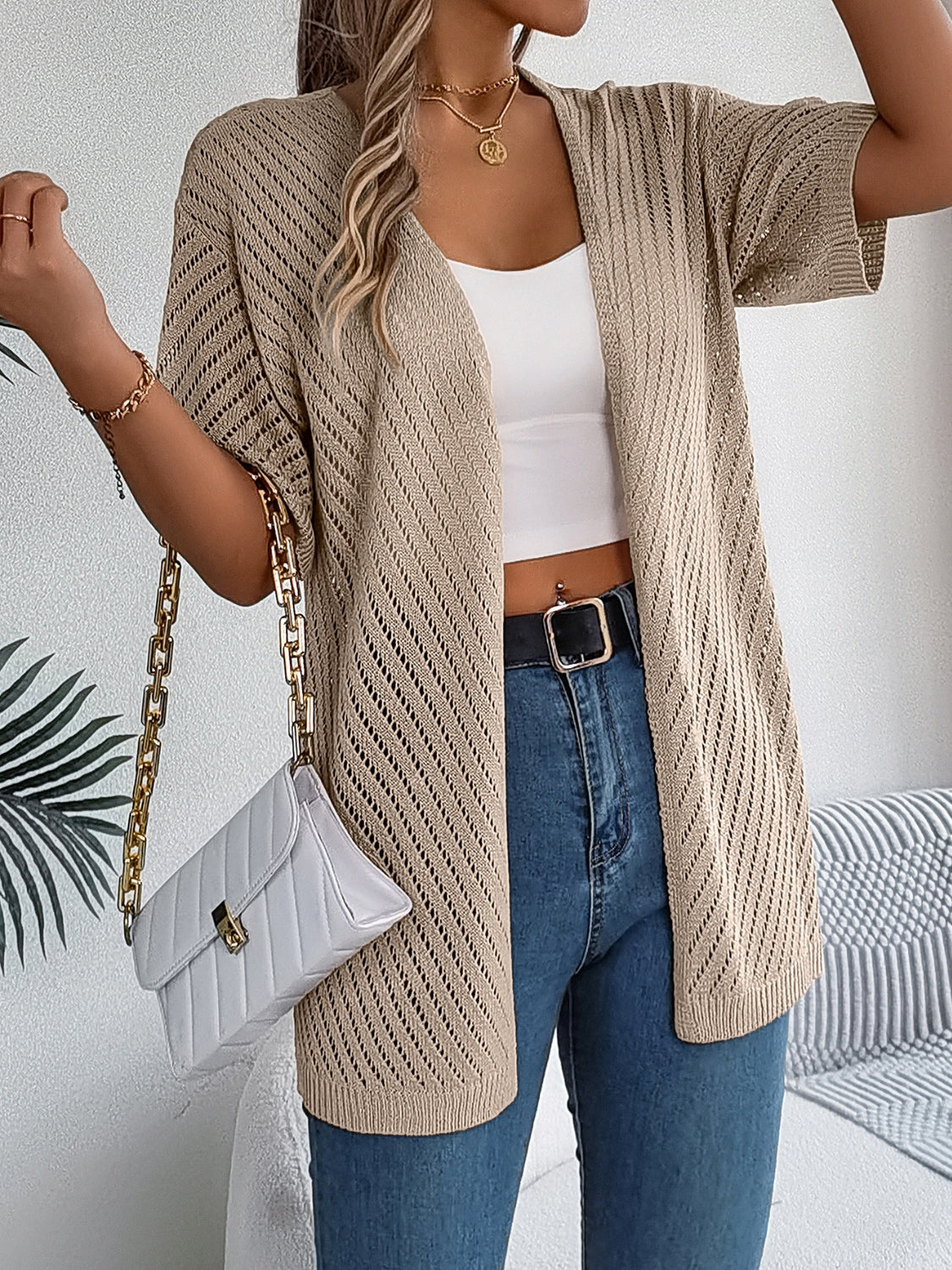 Khaki open-knit slouchy cardigan with short sleeves and a relaxed fit.