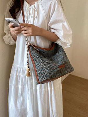 Tassel Woven Crossbody Bag in French Blue, side view