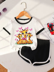 Baby outfit set with white t-shirt featuring giraffe graphic and black shorts with white trim.