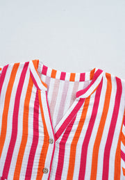 Textured stripe blouse in red with gathered sleeves and button detail