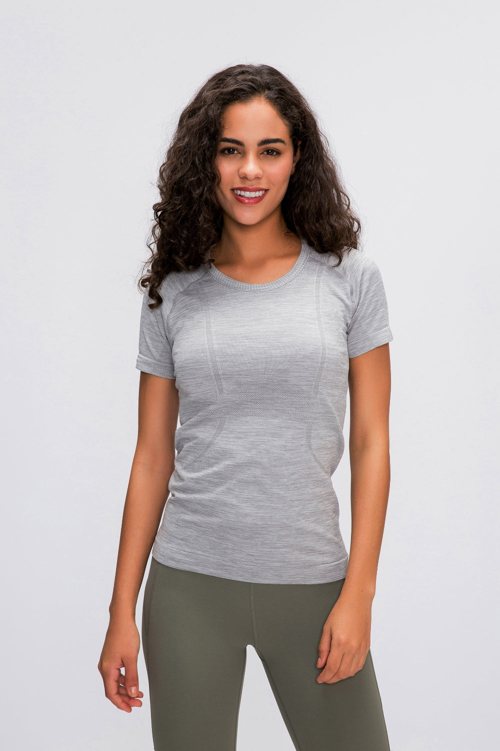 Sculpted Active Seamless Tee in gray with textured detail, crew neck, and short sleeves.