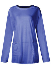 Relaxed fit royal blue tunic with long sleeves and two patch pockets.