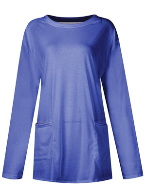 Relaxed fit royal blue tunic with long sleeves and two patch pockets.