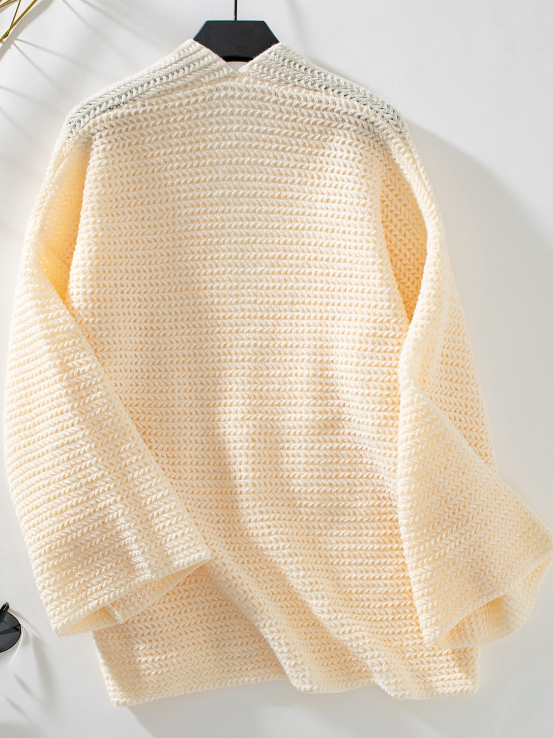 Chunky knit open front cardigan in cream with a textured stitch and relaxed fit.