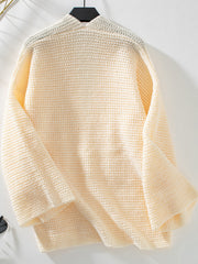 Chunky knit open front cardigan in cream with a textured stitch and relaxed fit.
