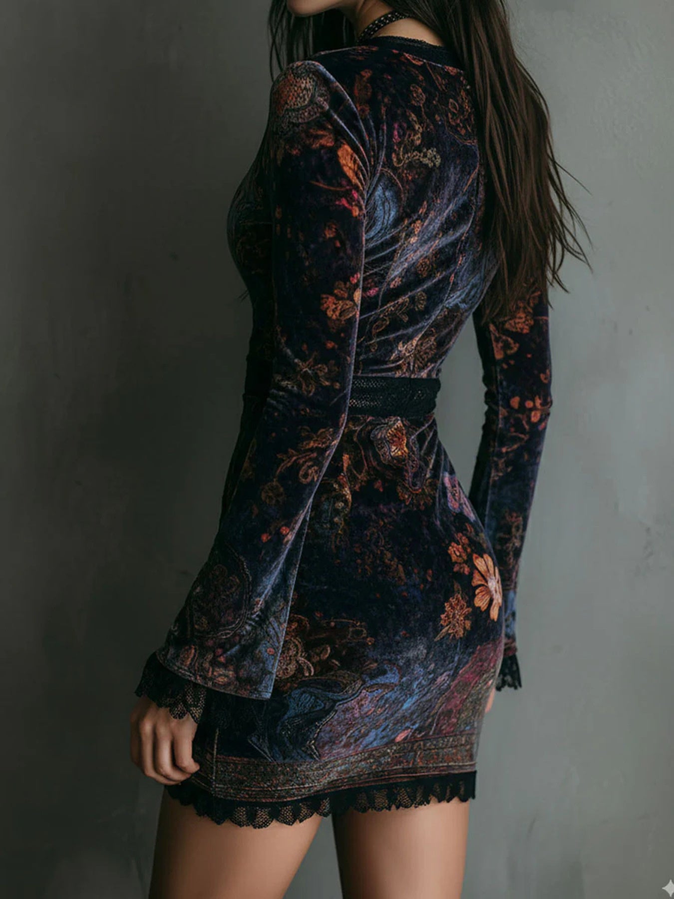 Velvet mini dress with floral print, lace trim, and long sleeves.