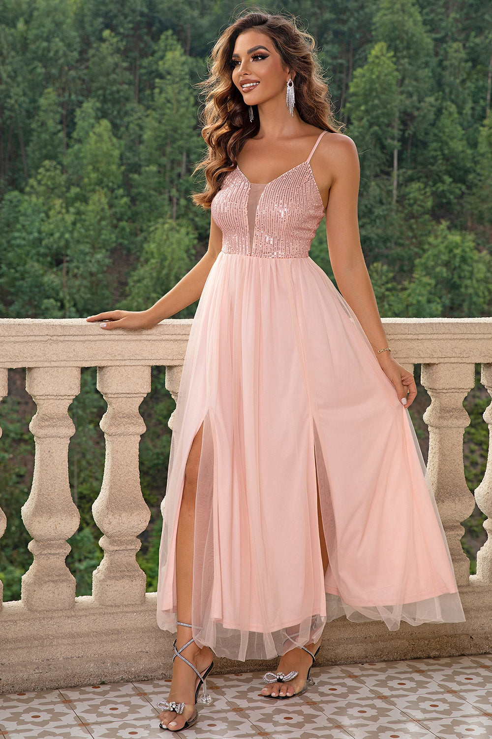 Blush pink sequin bodice maxi dress with double slits and tulle overlay.
