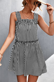 Black striped mini dress with square neckline, ruffle yoke, and elastic waist.