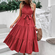 Burgundy halter neck tiered midi dress with belted waist and ruffle hem