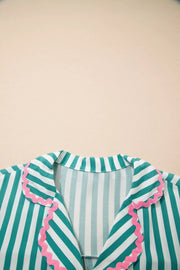 Green and white striped pajama top with pink ruffled collar detail