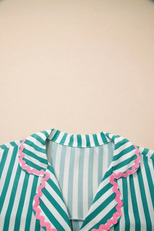 Green and white striped pajama top with pink ruffled collar detail