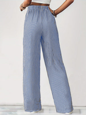 Blue and white striped wide-leg drawstring trousers with a relaxed fit.