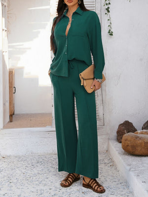 Dark green textured resort shirt and wide leg pants set with drawstring waist.