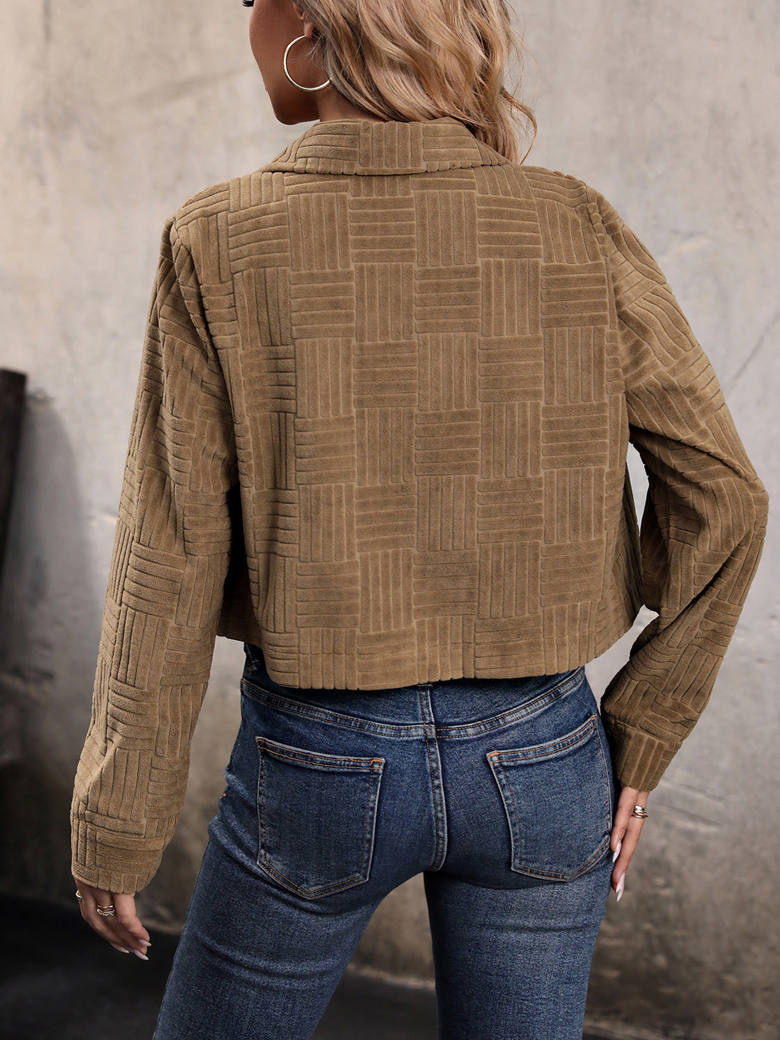 Textured corduroy cropped utility jacket in caramel with a basketweave pattern.