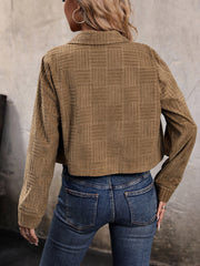Textured corduroy cropped utility jacket in caramel with a basketweave pattern.