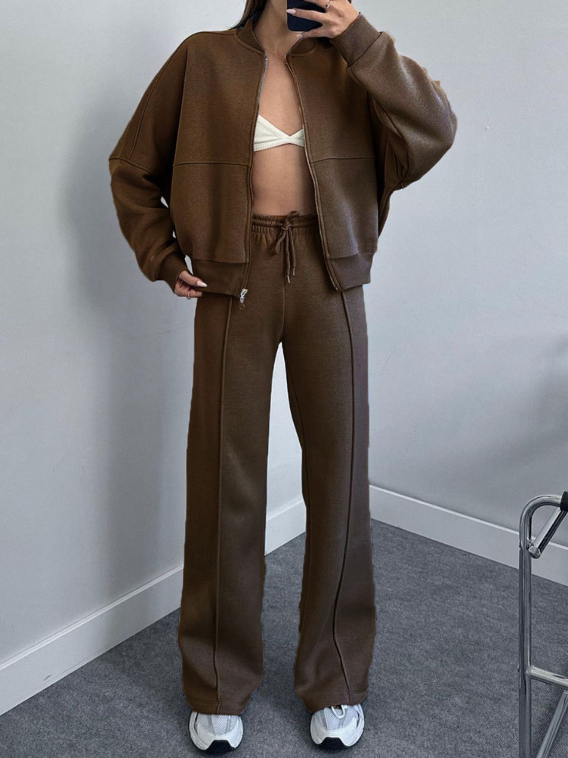 Sporty chic zip-up coord set in coffee brown, featuring a bomber jacket and wide-leg pants with drawstring waist.