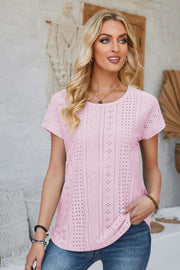 Perforated eyelet tee in blush pink with short sleeves and a crew neck.