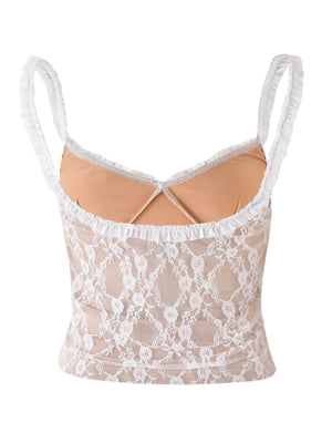 Lace ruffle trim cami in tan with a bow detail and crisscross straps.