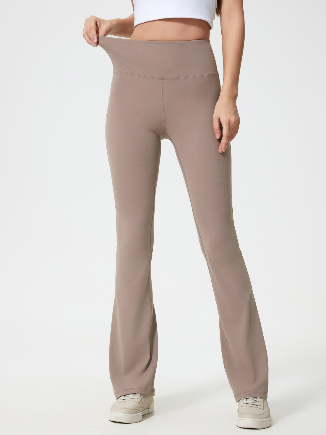 Flared sculpt leggings in mocha with a high-rise waist and subtle flare at the hem.