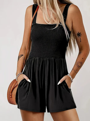 Black smocked bodice wide-leg jumpsuit with square neckline and pockets