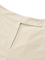 Beige tailored trousers with a button closure and cuffed hemline detail.