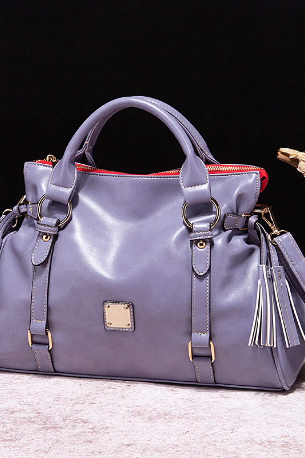 Blue Purple structured satchel bag with tassel detail and gold hardware
