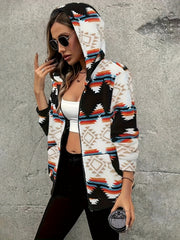 Aztec geo-print sherpa zip hoodie in black with colorful geometric patterns.