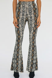 Serpentine print bell-bottom pants with a second-skin fit.