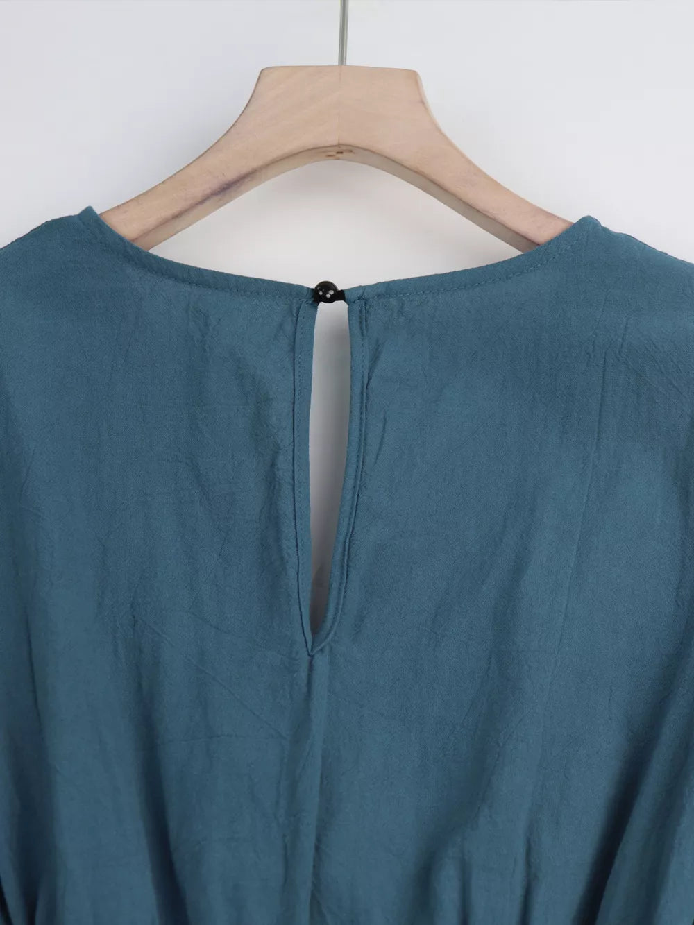 Haze Blue cotton romper with button-back keyhole detail