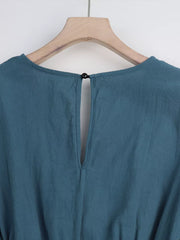Haze Blue cotton romper with button-back keyhole detail