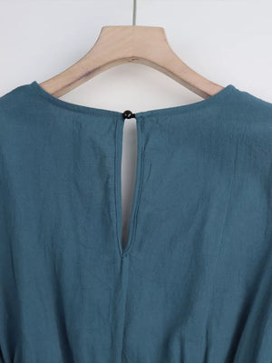 Haze Blue cotton romper with button-back keyhole detail