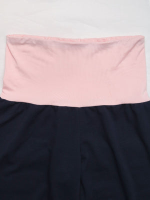Navy palazzo pants with a pink contrast waistband