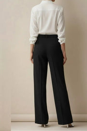 Black high-waisted wide-leg trousers with a belt and creased front.